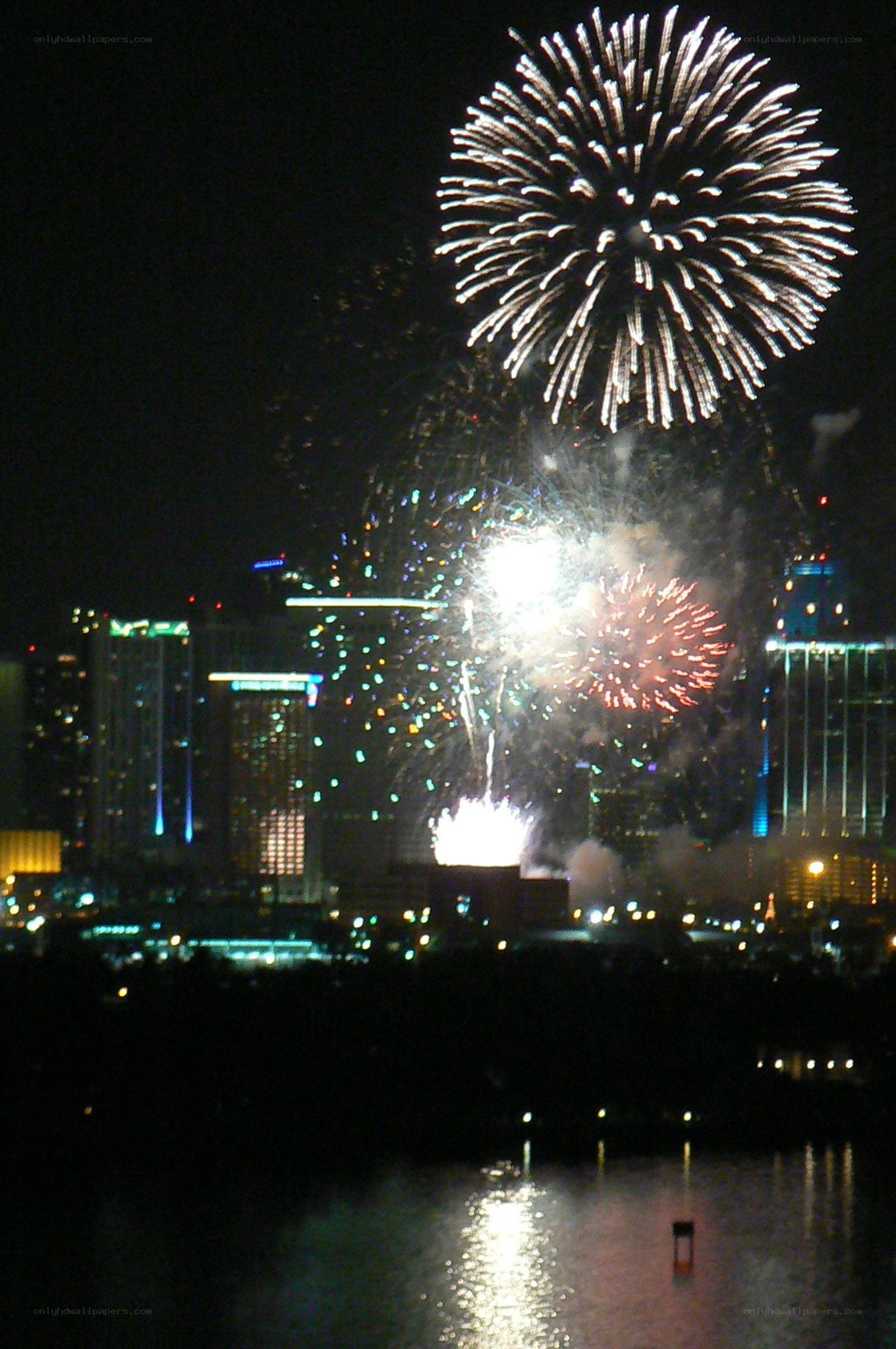 Fireworks over city skyline