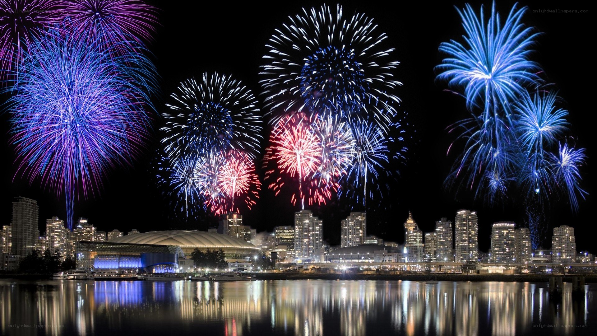 Fireworks over city skyline