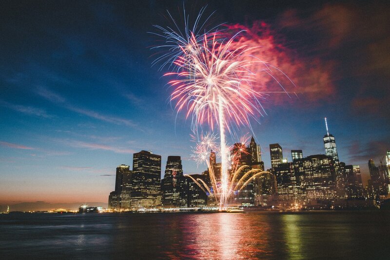 Fireworks over City Skyline — Blue, Celebratory, Night, Photograph, Skyscraper