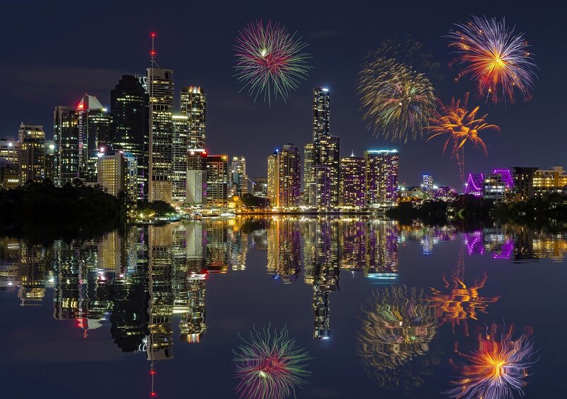 Fireworks over City Skyline — Blue, Celebratory, Night