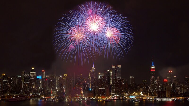 Fireworks over City Skyline — Blue, Celebratory