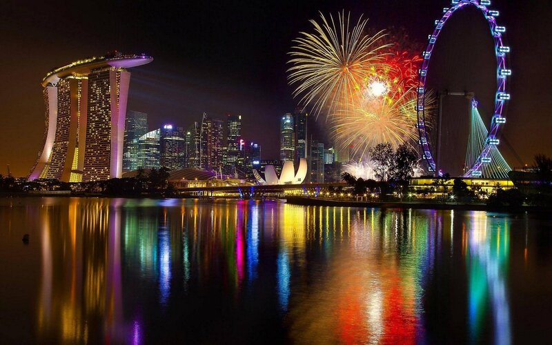 Fireworks over City Skyline — Yellow, Festive