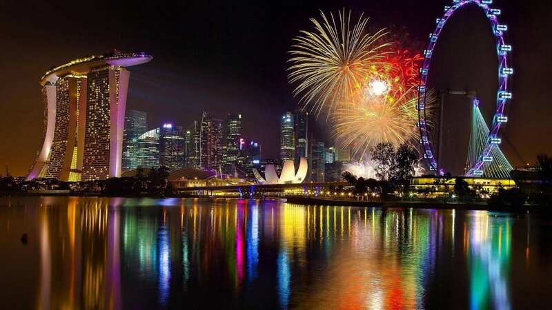 Fireworks over City Skyline — Yellow