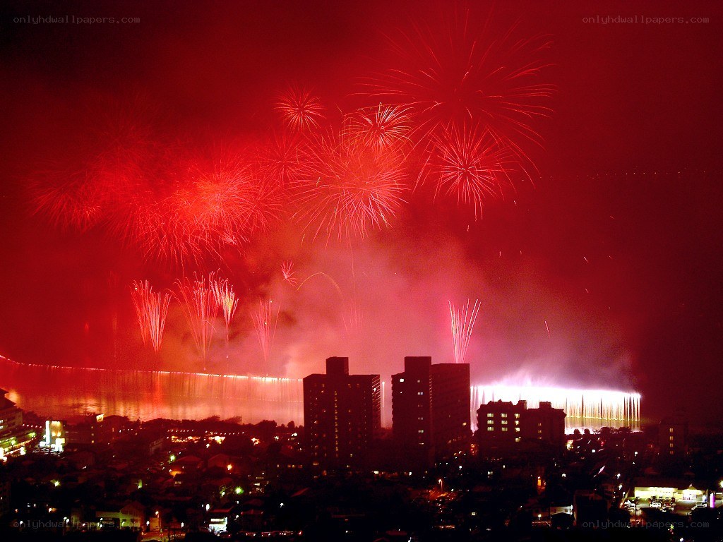 Fireworks over coastal city