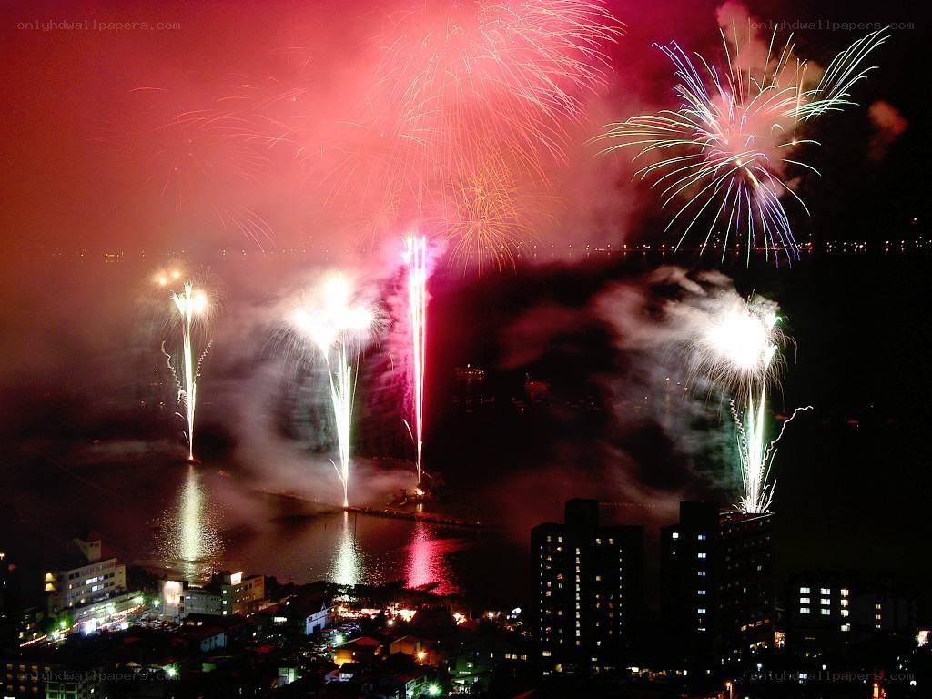 Fireworks over coastal city