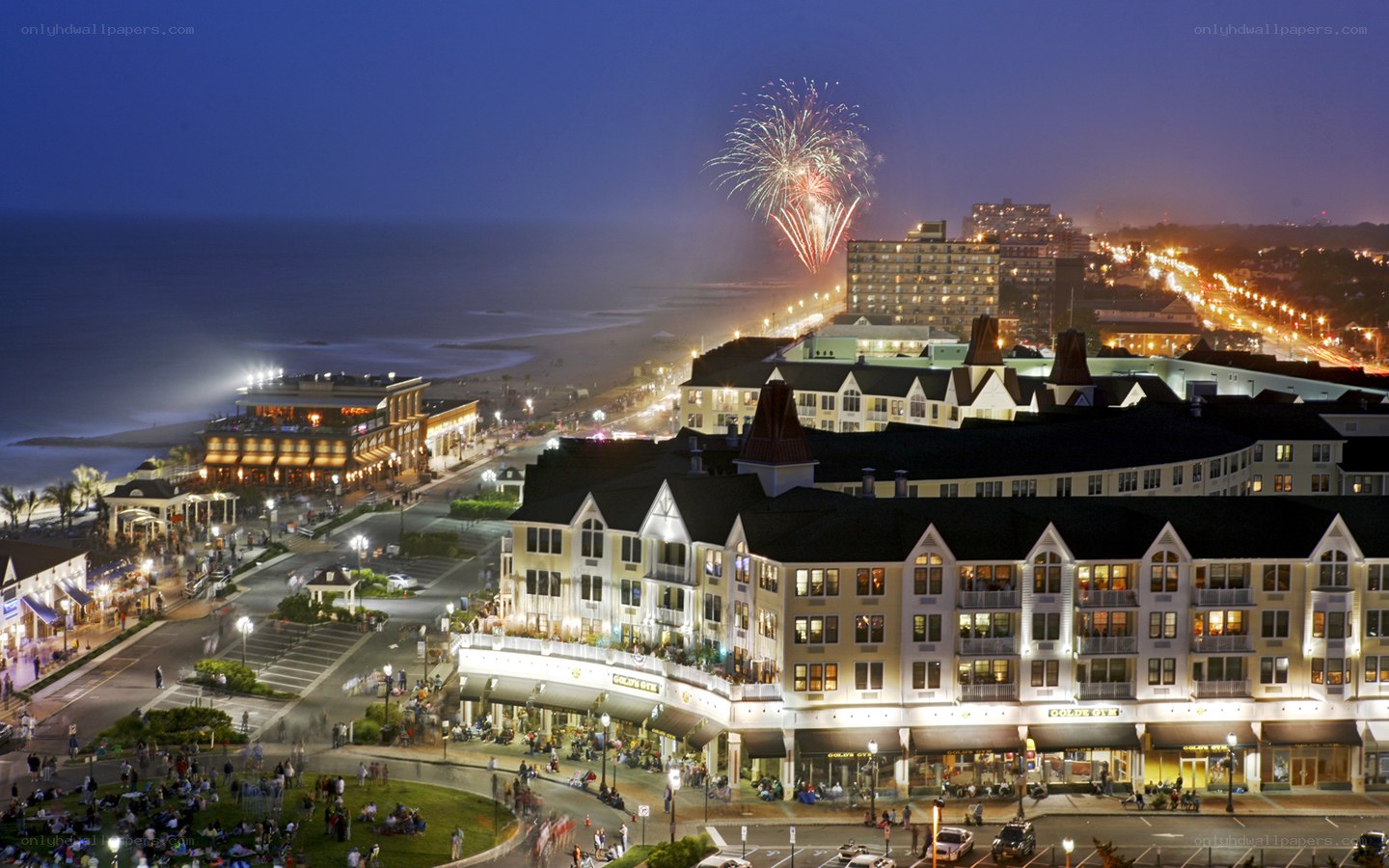Fireworks over coastal town