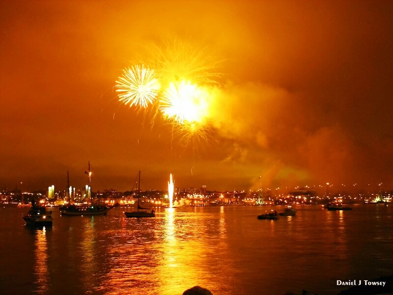 Fireworks over Harbor — Orange, Dramatic