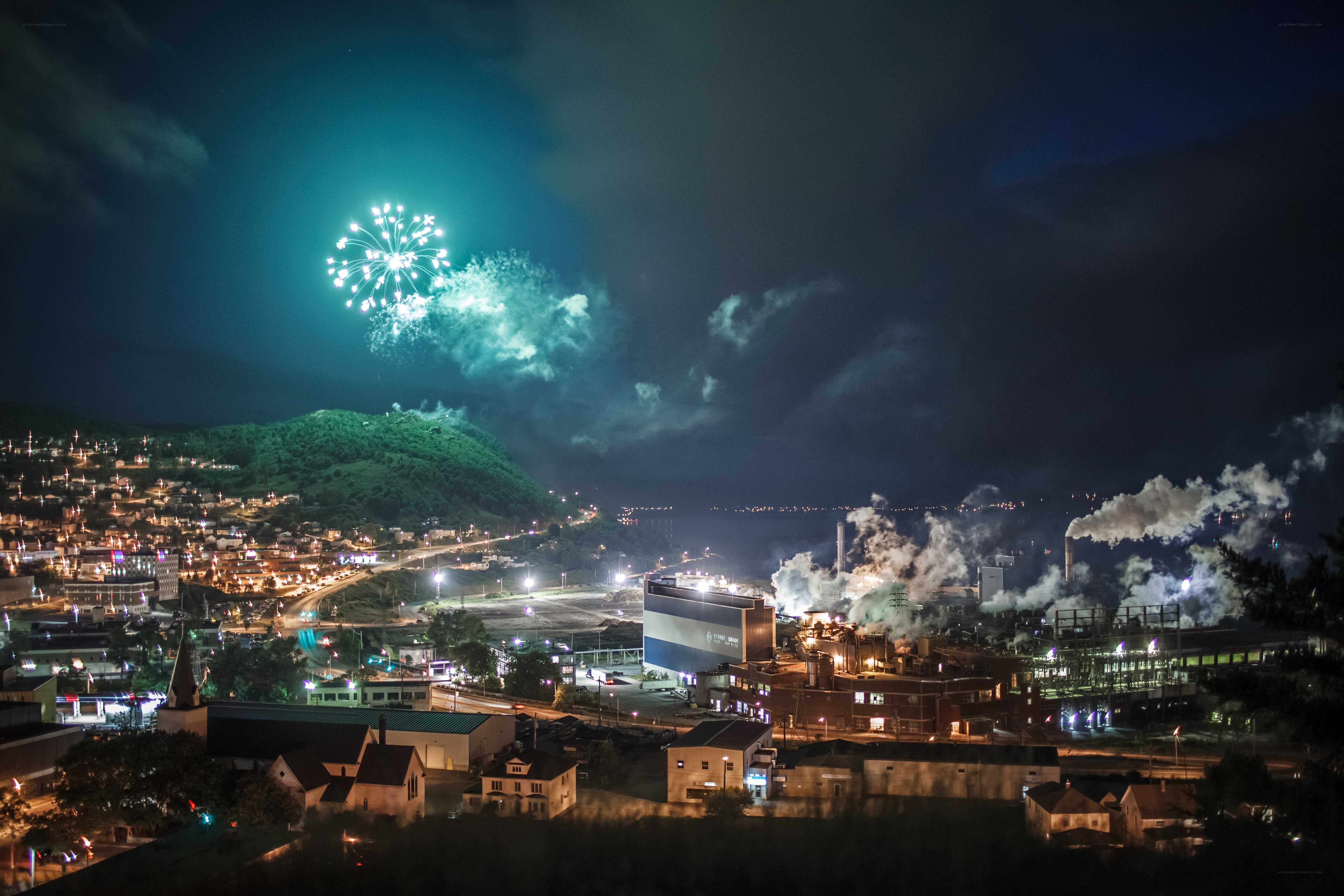 Fireworks over industrial town