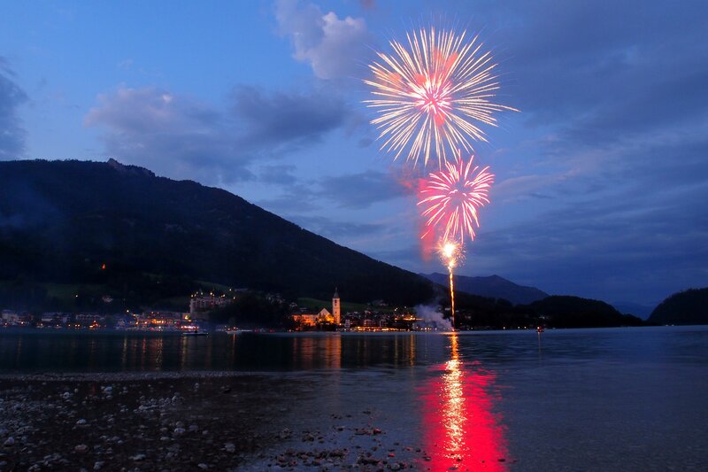 Fireworks over Lake — Blue, Dramatic, Night, Photograph, Mountain, Town