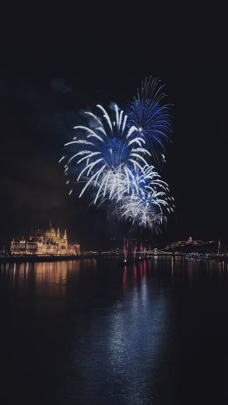 Fireworks over River — Blue, Dramatic