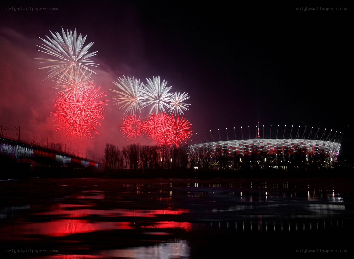 Fireworks over stadium at night