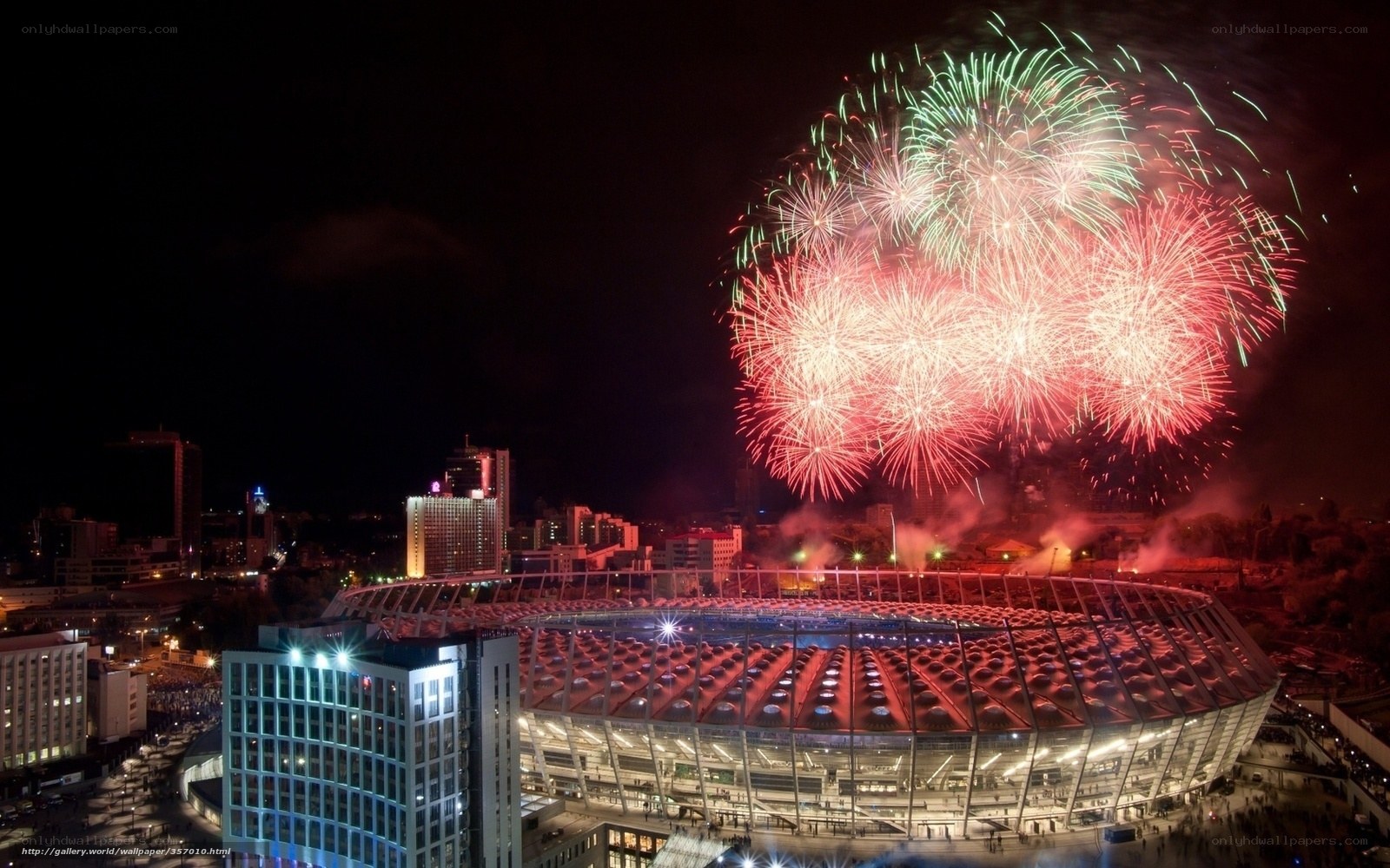 Fireworks over stadium at night