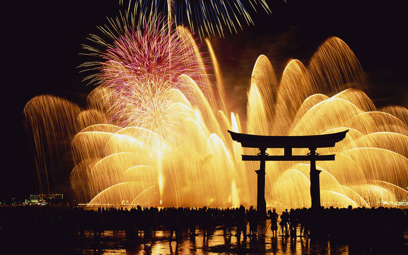 Fireworks over torii gate