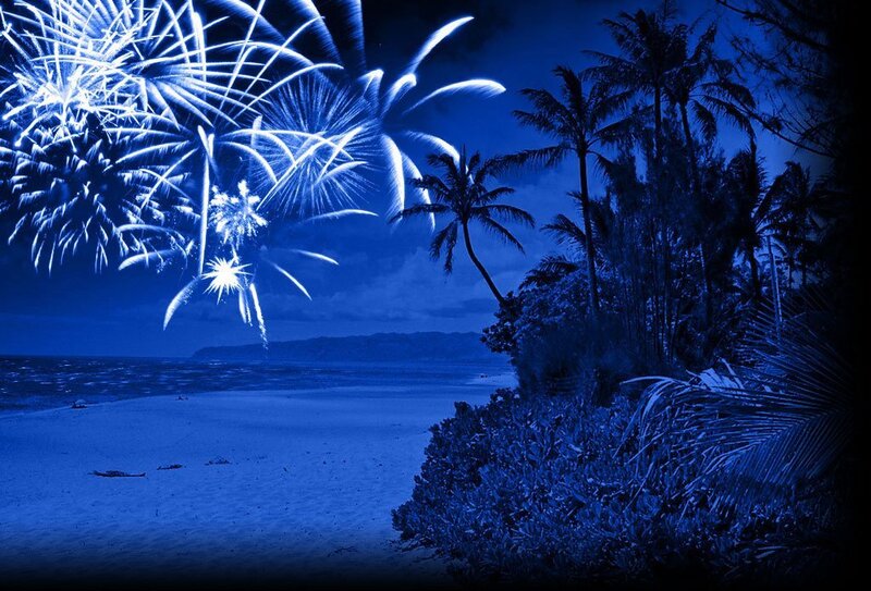 Fireworks over tropical beach
