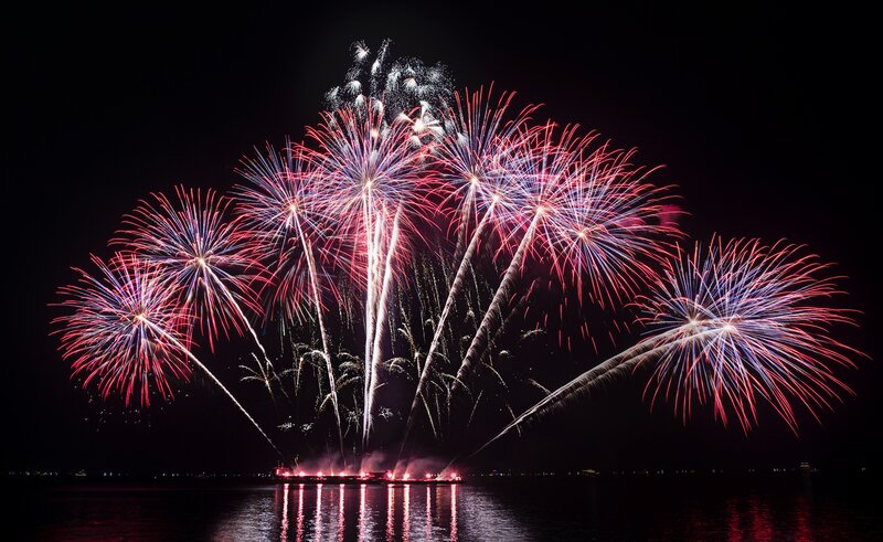 Fireworks over Water — Red, Dramatic, Night, Photograph, Explosions