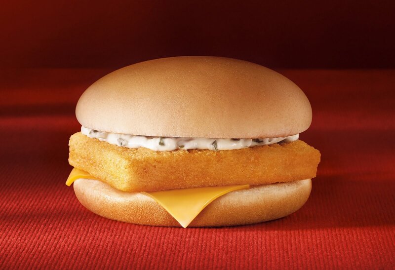 fish burger on red surface