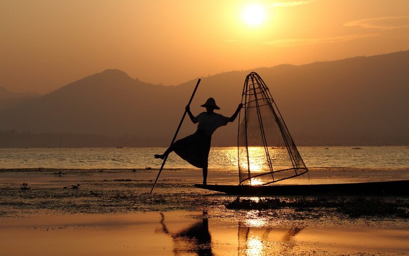 Fisherman at sunset on Inle Lake