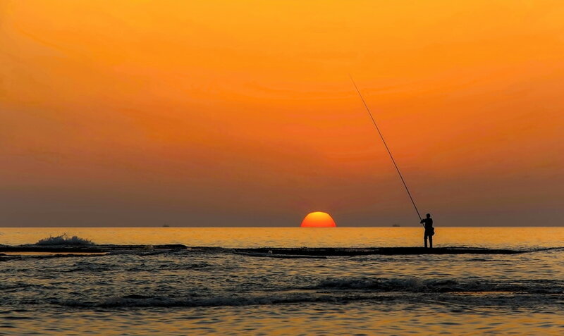 Fisherman at Sunset — Orange, Serene, Photograph, Sun