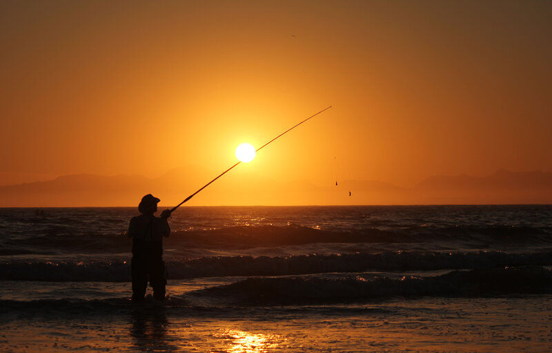 Fisherman at Sunset — Orange, Serene, Photograph