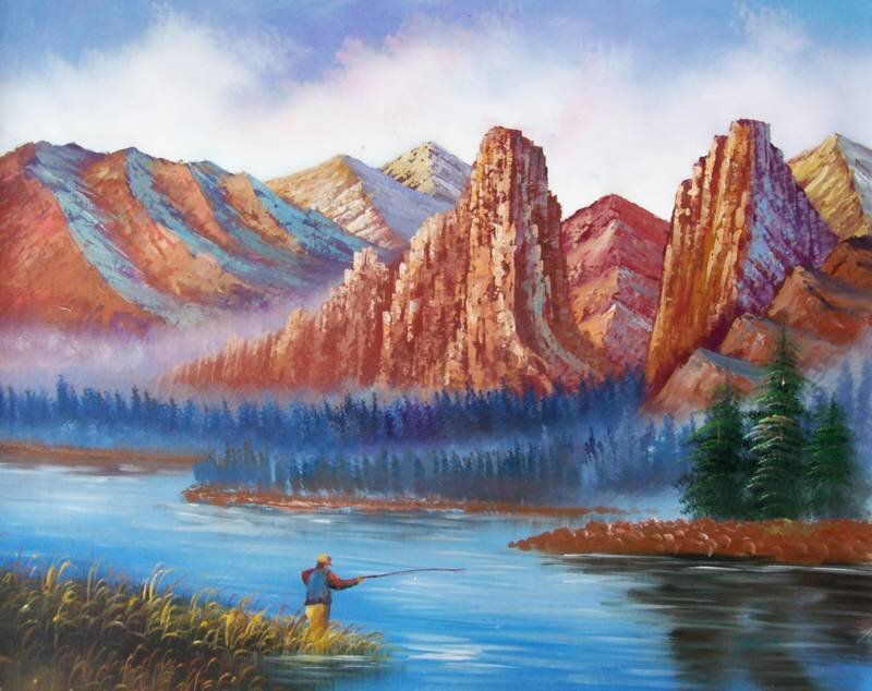 Fisherman by the mountain lake