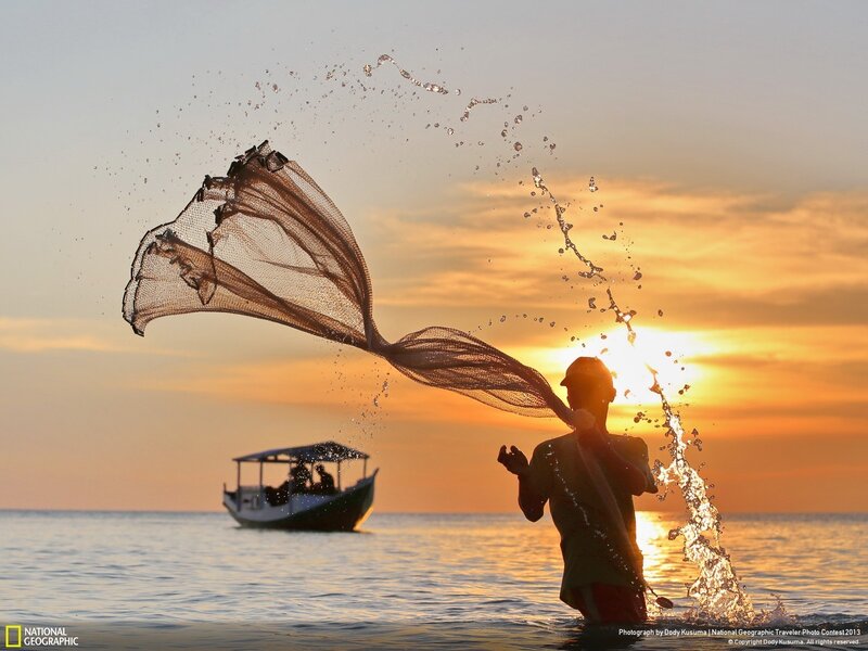 Fisherman Casting Net — Orange, Dramatic, Sunset, Photograph, Boat