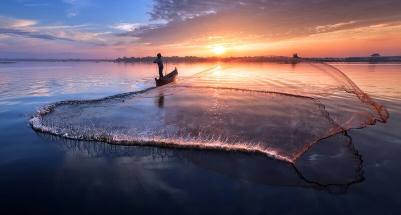 Fisherman Casting Net — Orange, Serene, Sunset, Photograph