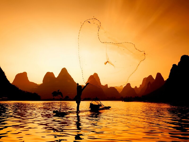 Fisherman Casting Net — Orange, Serene