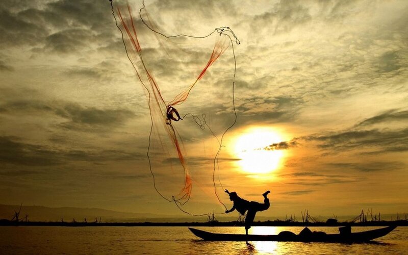 Fisherman Casting Net — Yellow, Dramatic