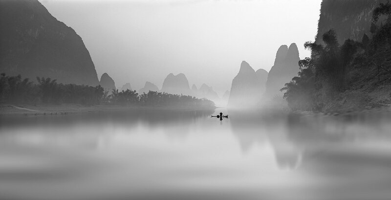 Fisherman in a Boat — Gray, Serene