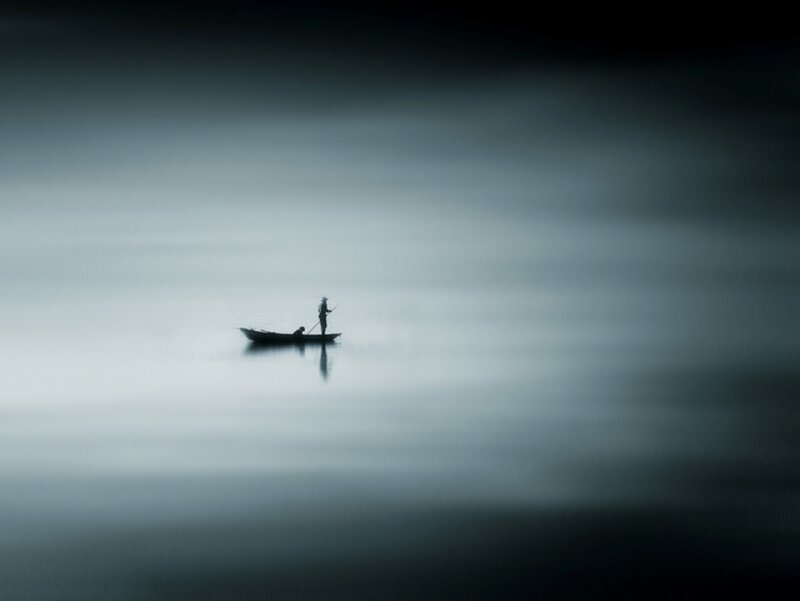 Fisherman in a Boat — Gray