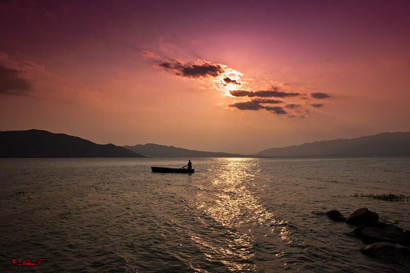 Fisherman in a Boat — Purple, Serene