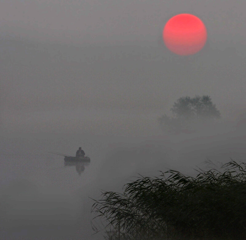 Fisherman in a Boat — Red, Misty