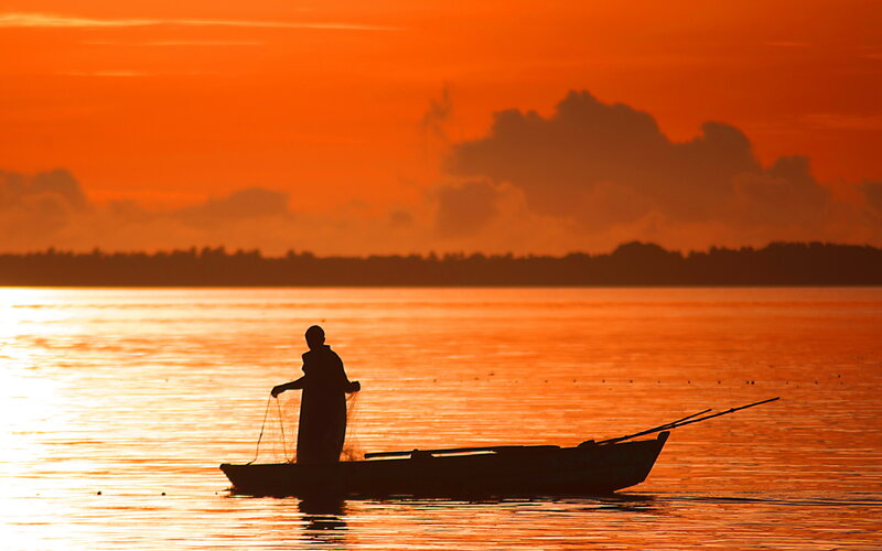 Fisherman in Boat — Orange, Serene