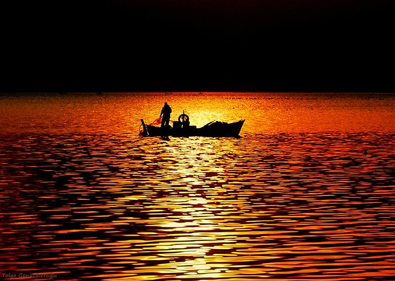 Fisherman in Boat — Orange