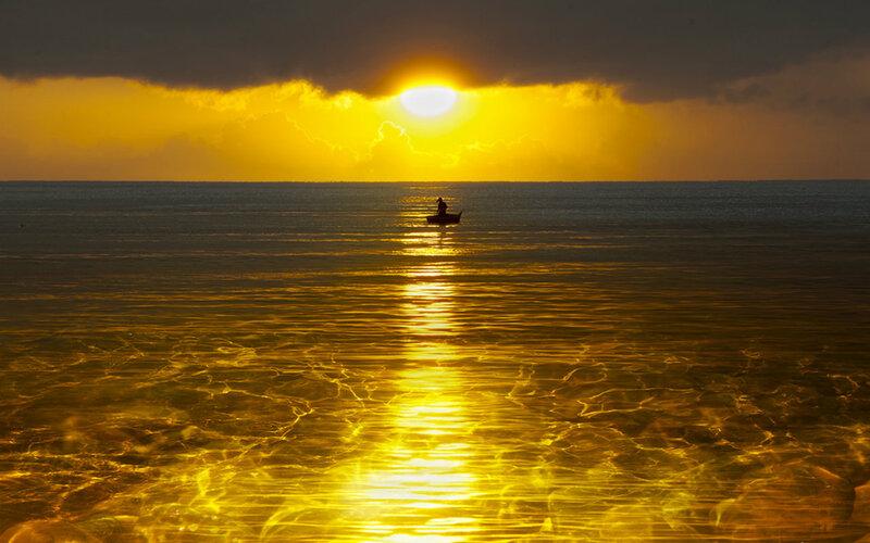 Fisherman in Boat — Yellow, Dramatic