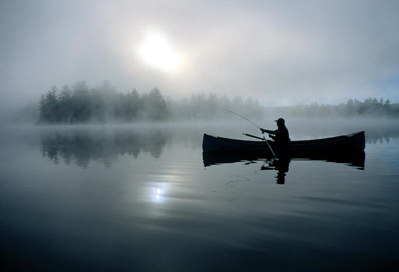 Fisherman in Canoe — Blue