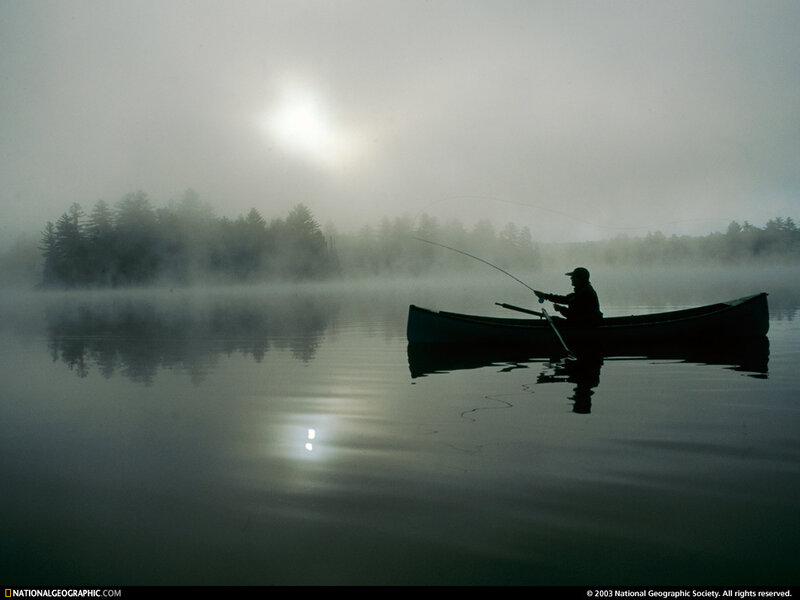 Fisherman in Canoe