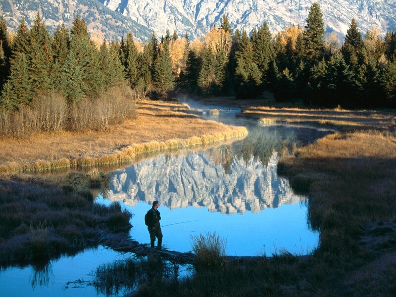 Fisherman in River — Blue