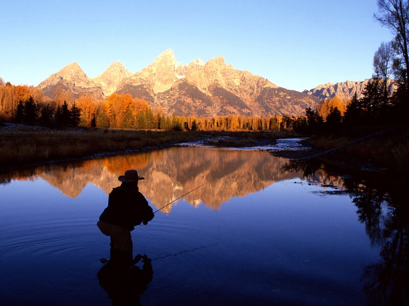 Fisherman in River