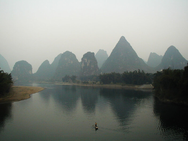Fisherman in Small Boat