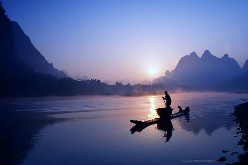 Fisherman on a Bamboo Raft — Blue