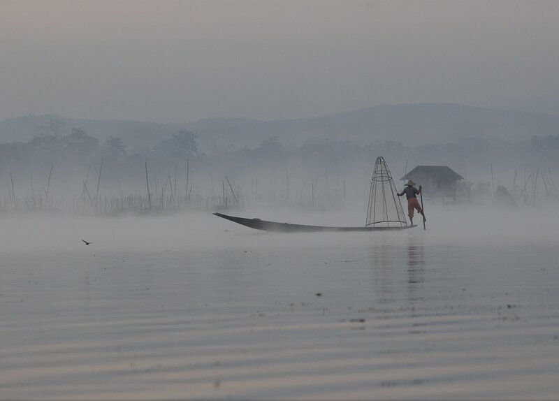 Fisherman on a Boat — Gray