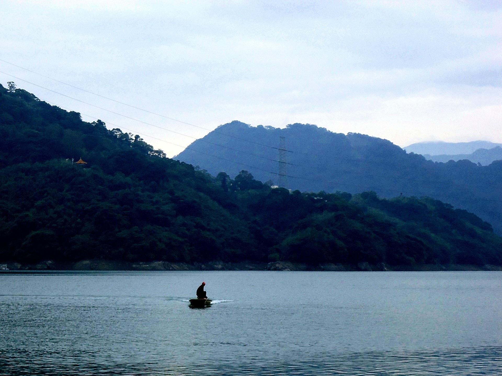 Fisherman on a lake