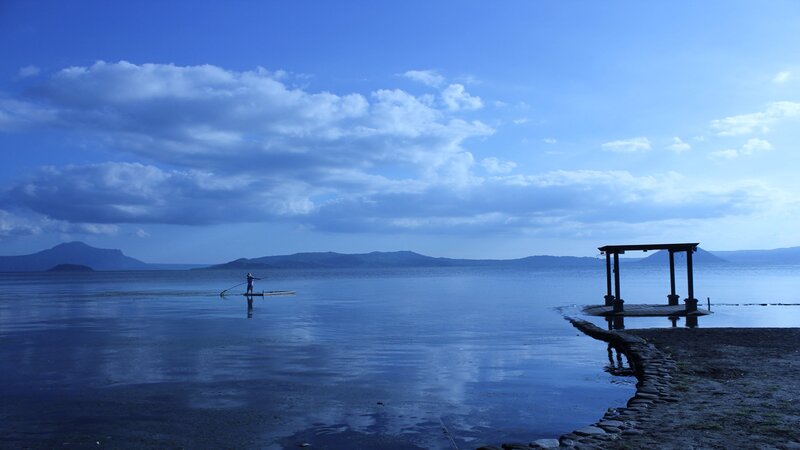Fisherman on a Lake — Blue
