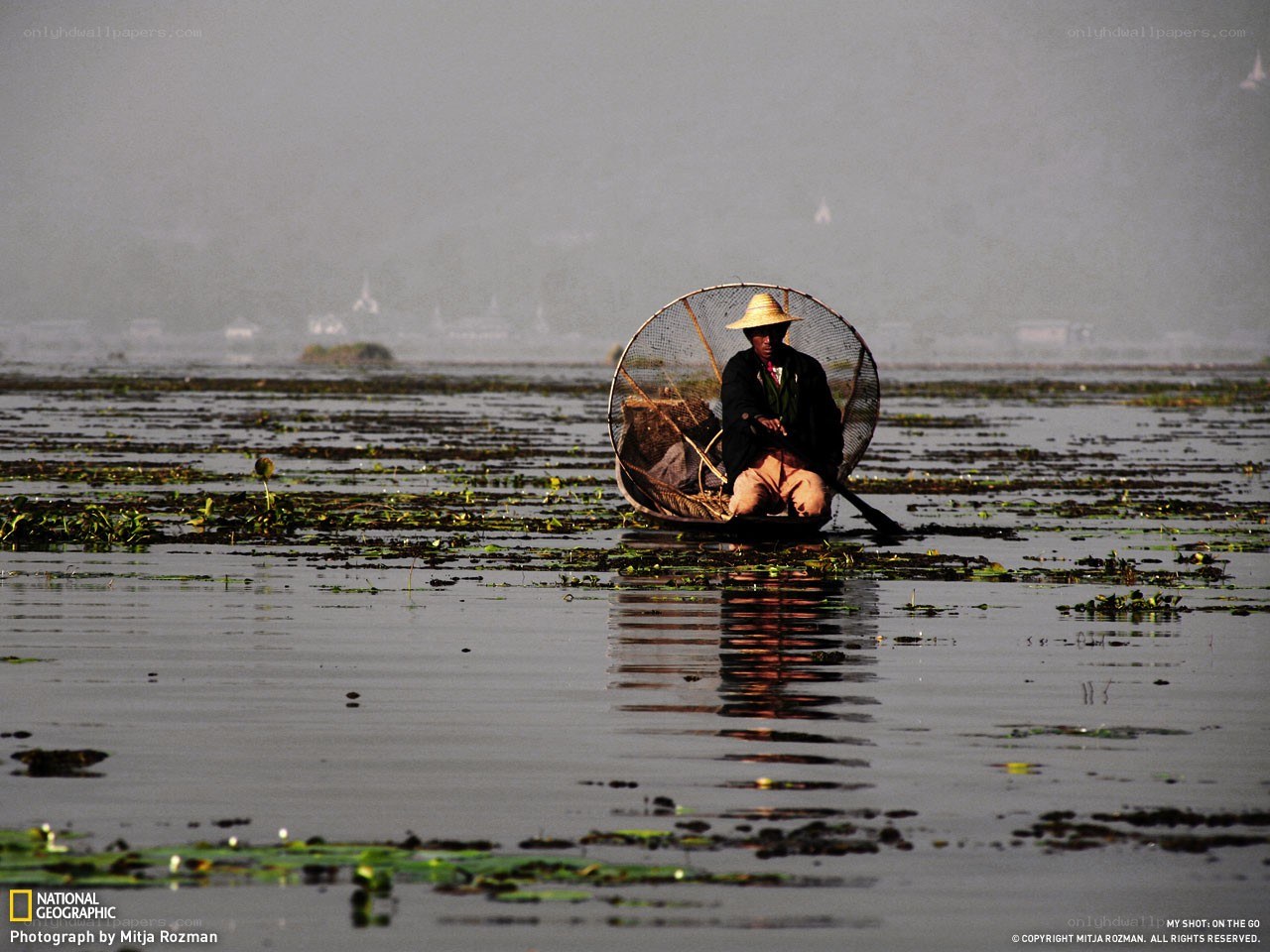 Fisherman on a lake