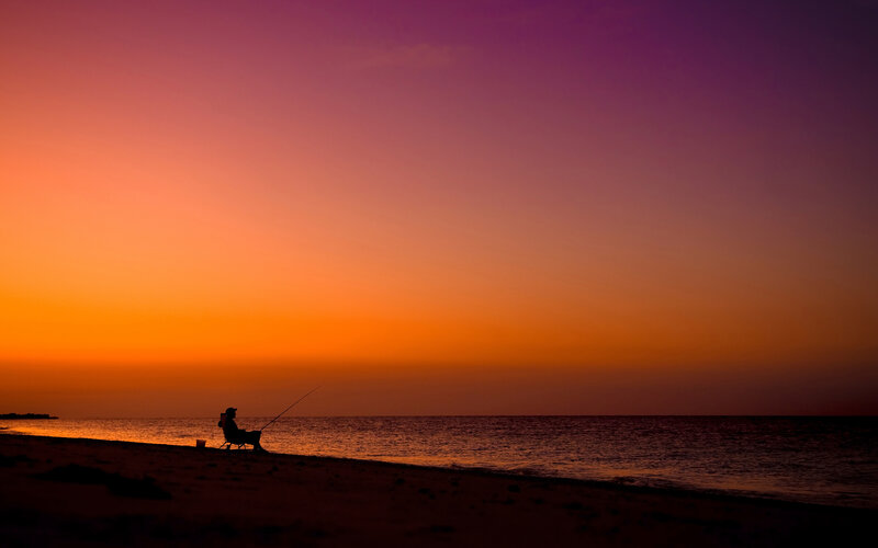 Fisherman on Beach — Orange