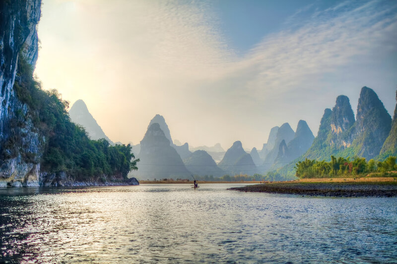 Fisherman on River — Blue