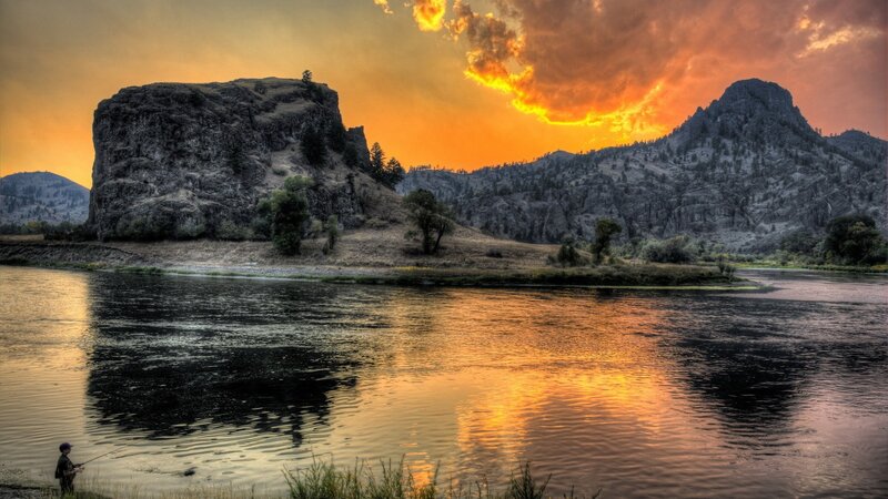 Fisherman on Riverbank — Orange, Dramatic, Sunset