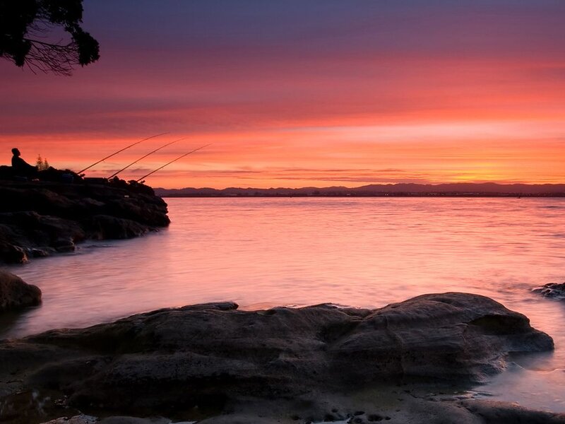 Fisherman on Rocks