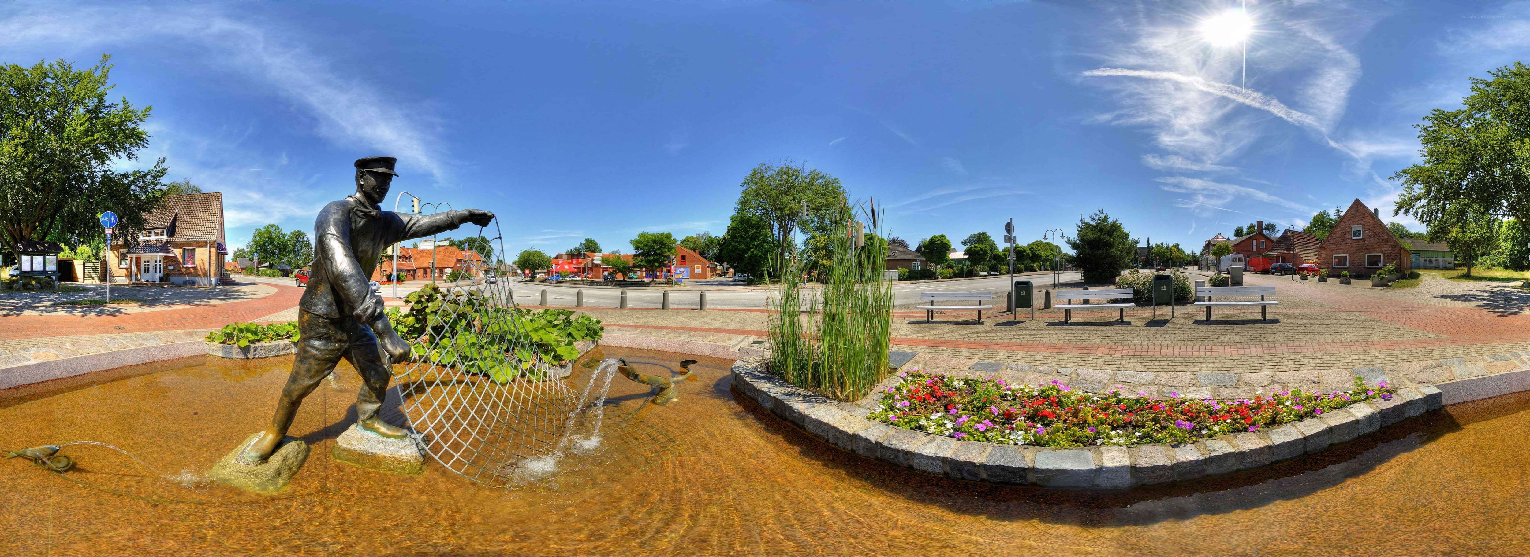 Fisherman statue in town square